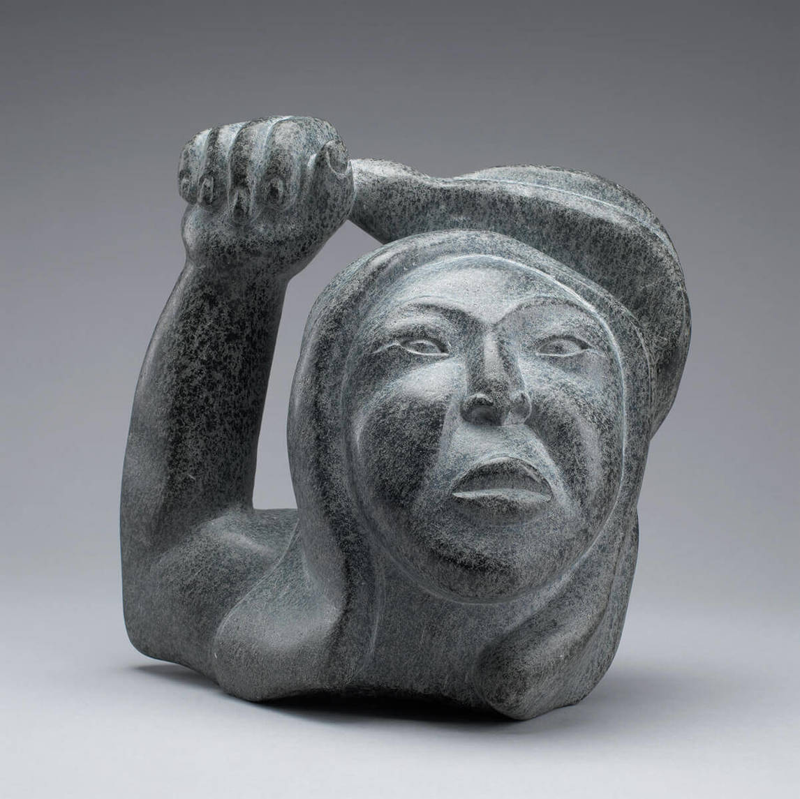Art Canada Institute, Qaqaq Ashoona, Bust of a Woman Holding “Ajuktaut” Racquet, c. 1977