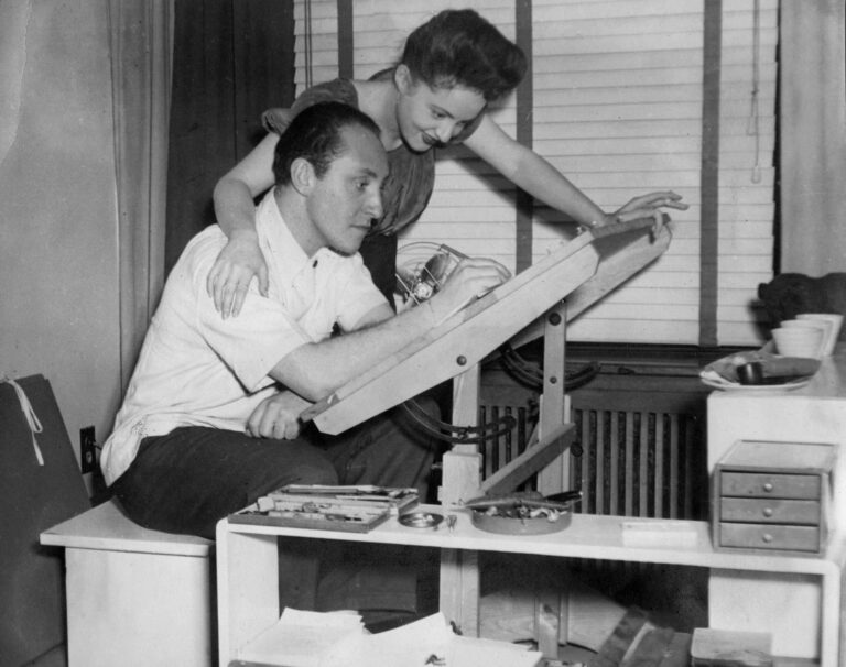 <p>Oscar and Mimi at the drafting table in Montreal, c. 1943, The Cahén Archives, Toronto.</p>
