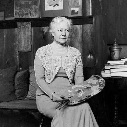 <p>Mary Hiester Reid in her studio, c.1911, photograph by William James.</p>
<p> </p>
<p>Banner: Mary Hiester Reid, <em>Chrysanthemums</em>, 1891, oil on canvas, 52.9 x 76.2 cm, National Gallery of Canada, Ottawa.</p>
