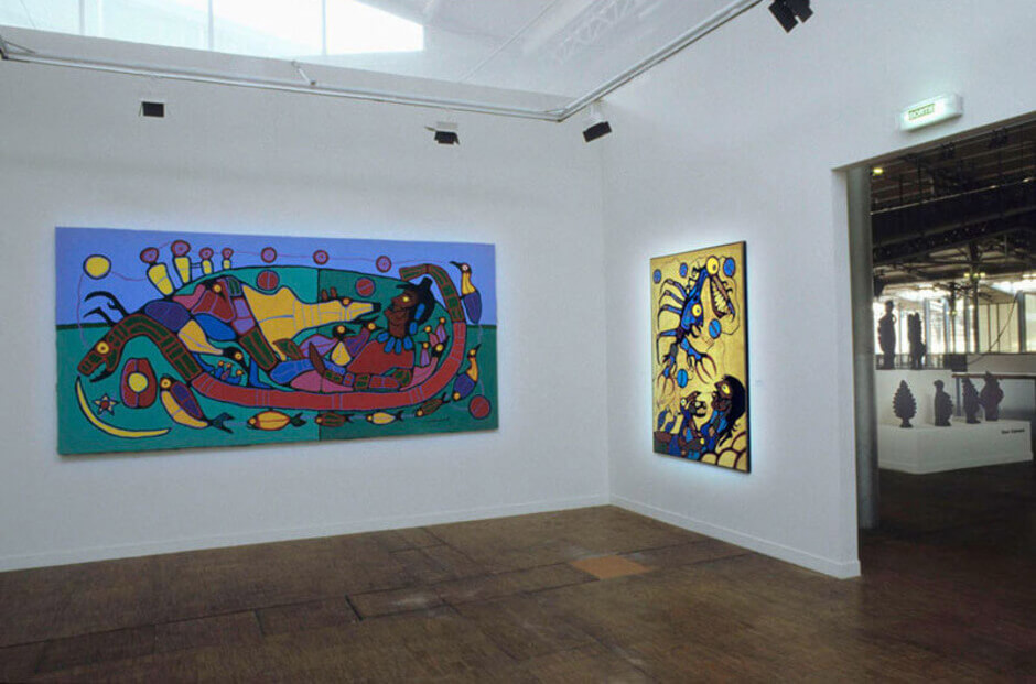 Art Canada Institute, Norval Morrisseau, Installation view of two works by Morrisseau in Magiciens de la Terre, 1989.