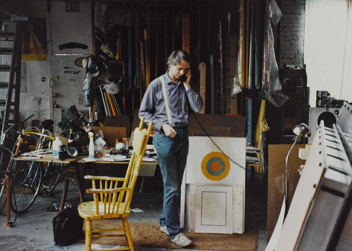 Art Canada Institute, Greg Curnoe, Greg Curnoe on the phone in the studio at 38 Weston Street, c. 1988–92