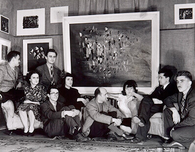 Art Canada Institute, Bourduas seated beneath his iconic painting Leeward of the Island, surrounded by members of the Automatistes