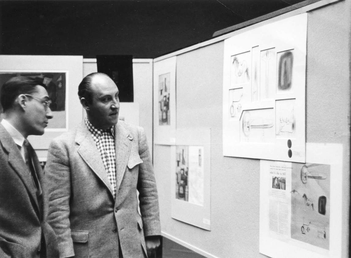 Art Canada Institute, Art Director Gene Aliman and Oscar Cahén at the Art Directors Club annual exhibition, 1955
