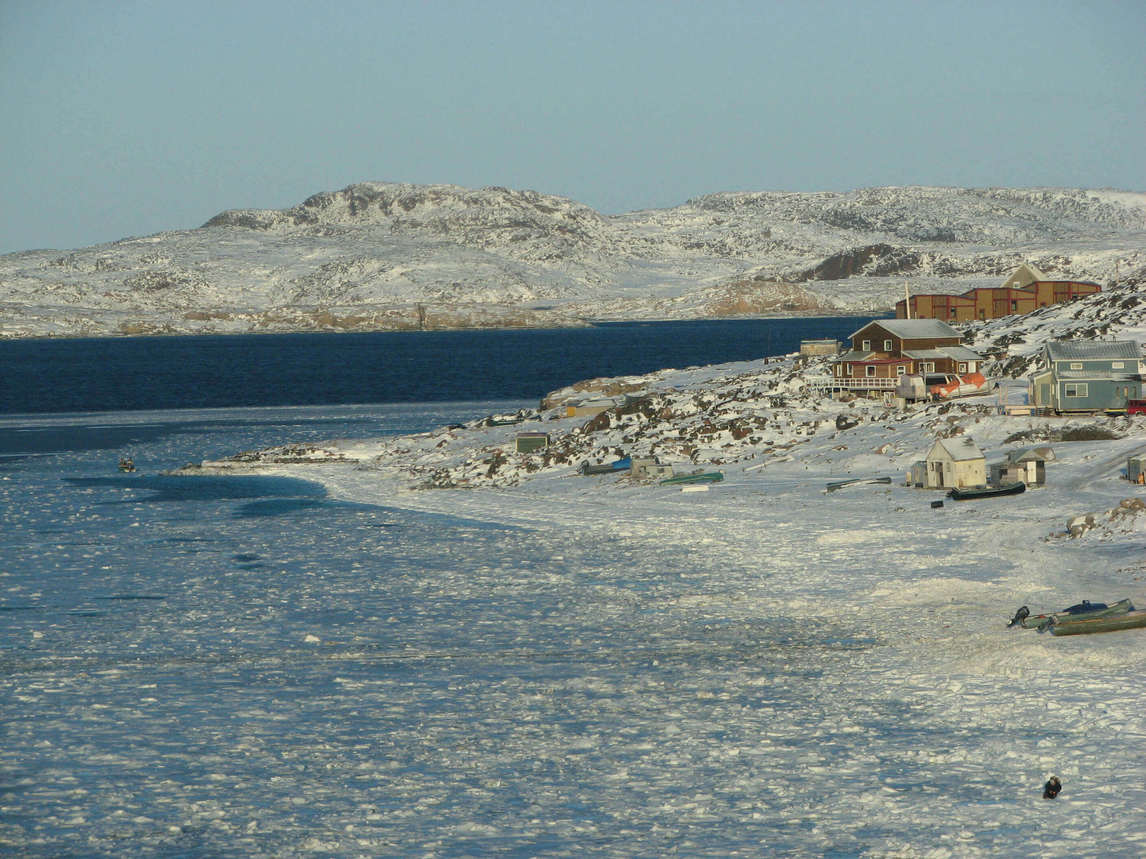 Art Canada Institute, Nancy Campbell, photograph of the community of Cape Dorset on the coast of Dorset Island, 2006