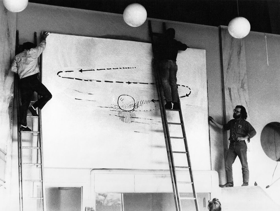 Artists Bryan Maycock, Steve Parzybok, and Robert Bozak help install Drop of Water on a Hot Surface, 1970