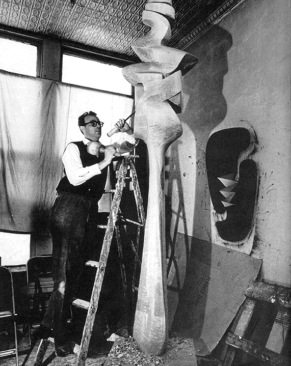 Sorel Etrog carving Waterbury in his Manhattan studio, 1961