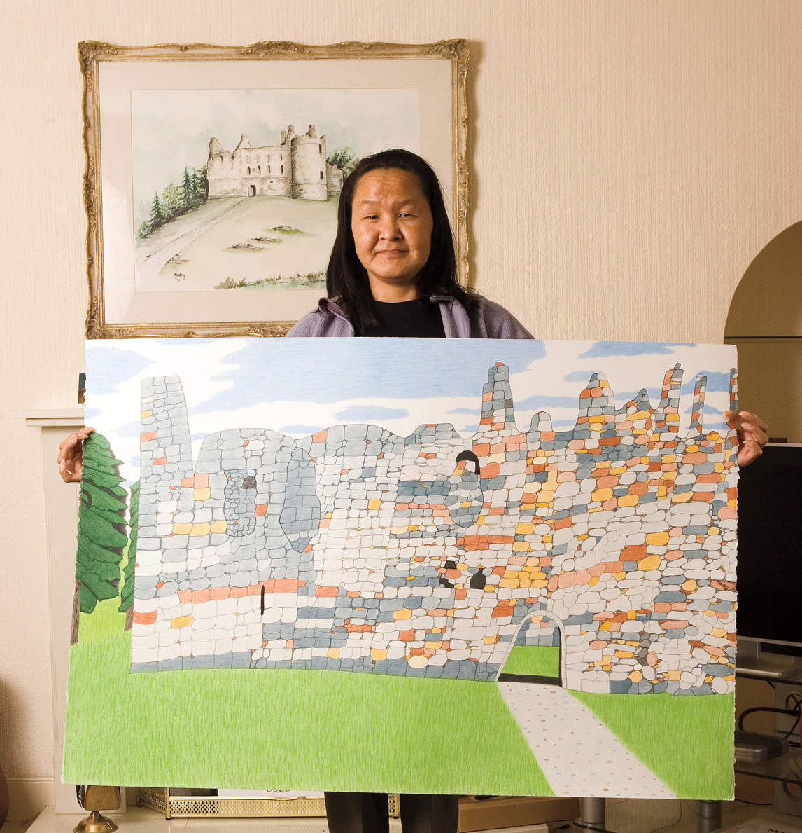 Annie Pootoogook holding her drawing Balvenie Castle, 2006