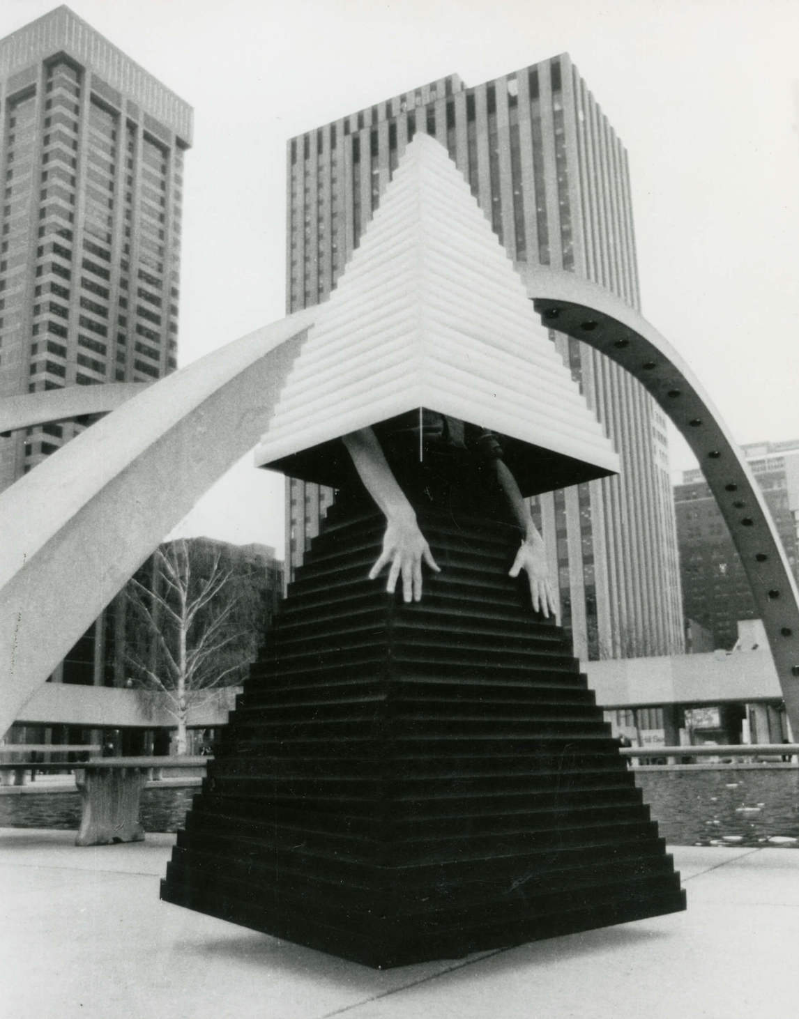 Art Canada Institute, Felix Partz models V.B. Gown #3 (Massing Studies for the Pavillion #3) at City Hall, Toronto, 1975