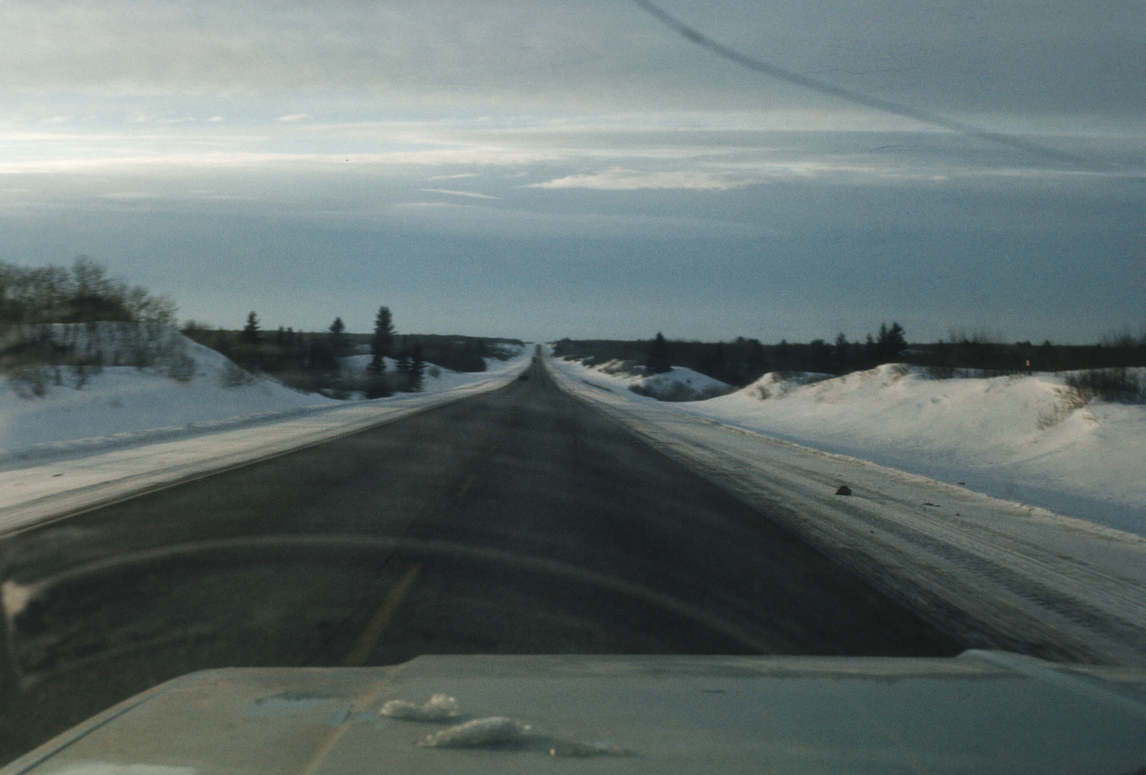 Art Canada Institute, William Kurelek, A view of the road from the dashboard of the artist’s Volkswagen Beetle
