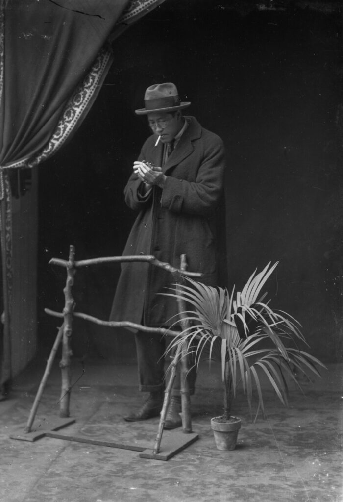 Unidentified Chinese Man Lighting a Cigarette