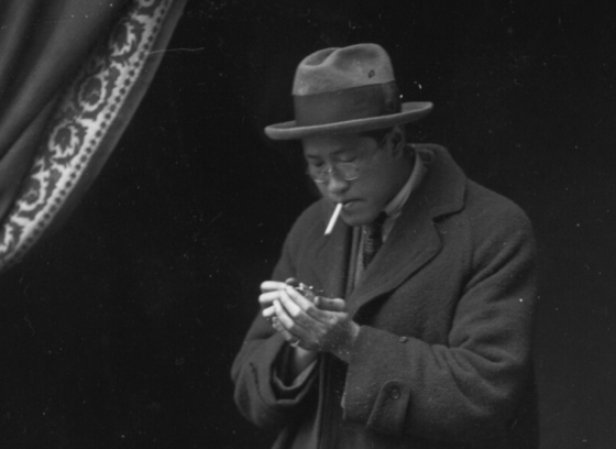 Unidentified Chinese Man Lighting a Cigarette
