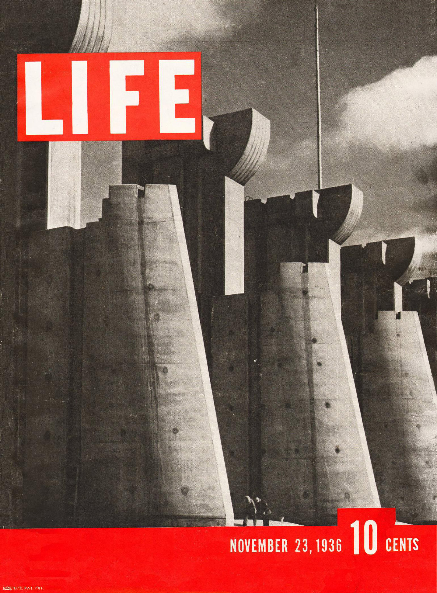 A cover image of Life magazine with a black and white picture of a dam